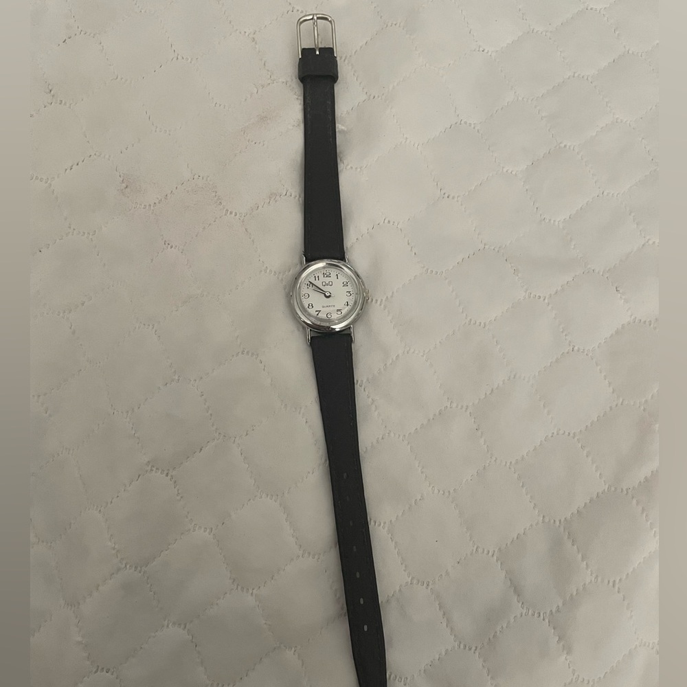 Q&Q ladies watch- black and white with black leather band